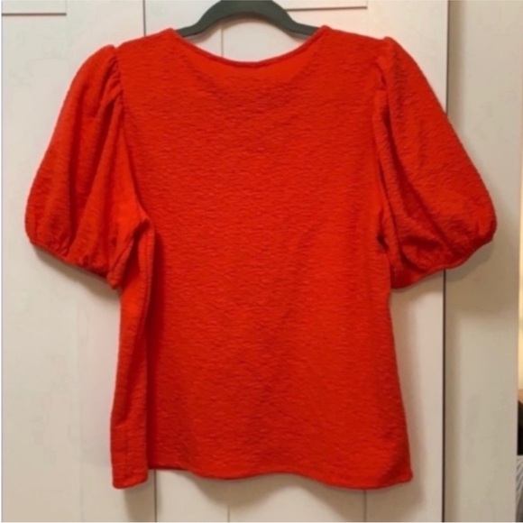 Red Short Sleeved Top Crinkle Material
Gorgeous Bright Red In Color NEW! - Picture 2 of 3